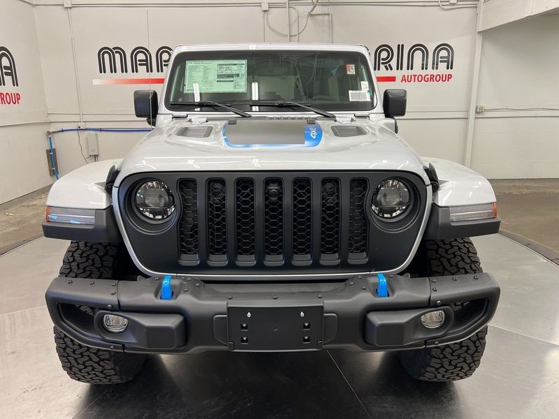 2023 Jeep Wrangler Rubicon 4xe in a Silver Zynith Clear Coat exterior color and Blackinterior. Marina Chrysler Dodge Jeep RAM (855) 616-8084 marinadodgeny.com 