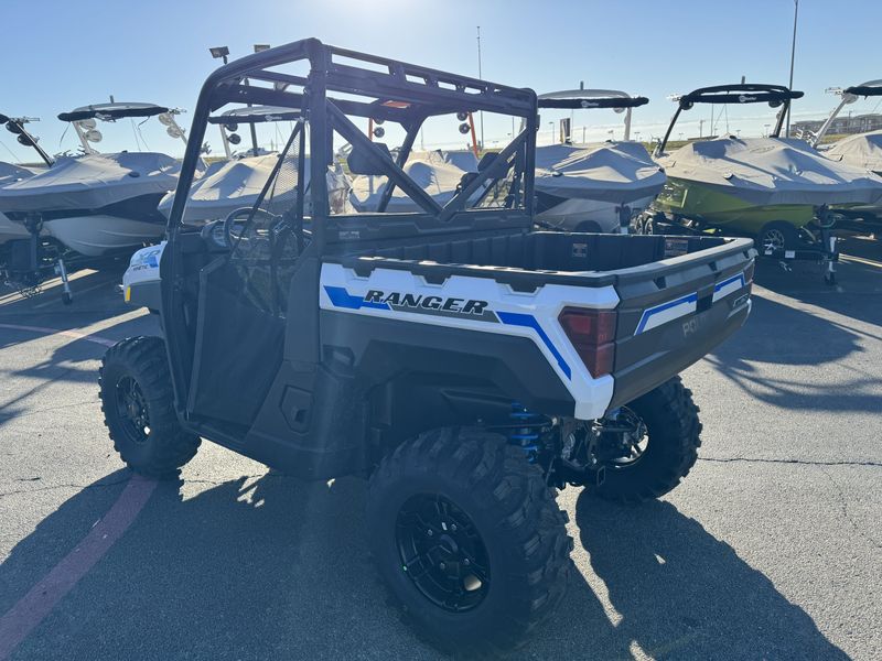 2024 POLARIS RANGER XP KINETIC ULTIMATE ICY WHITE PEARL in a WHITE exterior color. Family PowerSports (877) 886-1997 familypowersports.com 