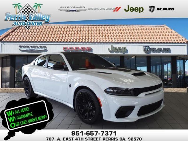2023 Dodge Charger SRT Hellcat Widebody in a White Knuckle Clear Coat exterior color and Blackinterior. Perris Valley Auto Center 951-657-6100 perrisvalleyautocenter.com 