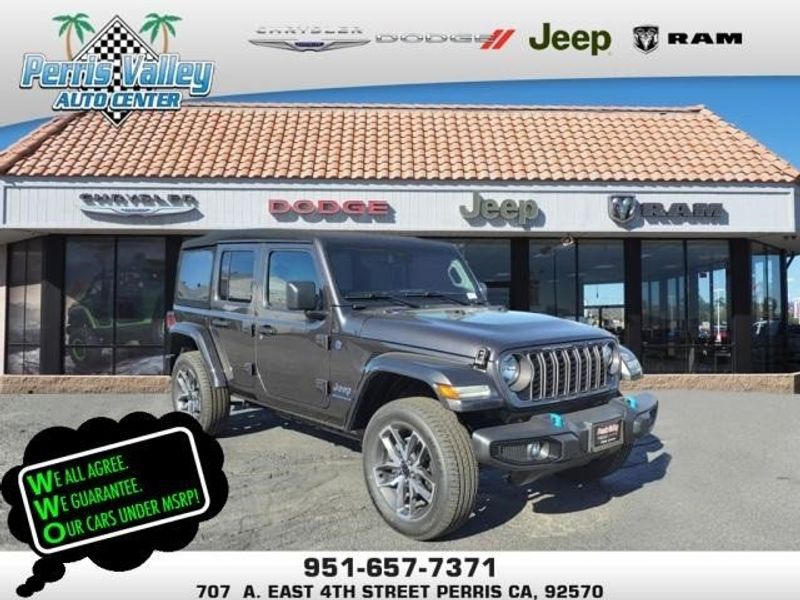 2024 Jeep Wrangler Sport S 4xe in a Granite Crystal Metallic Clear Coat exterior color and Blackinterior. Perris Valley Auto Center 951-657-6100 perrisvalleyautocenter.com 