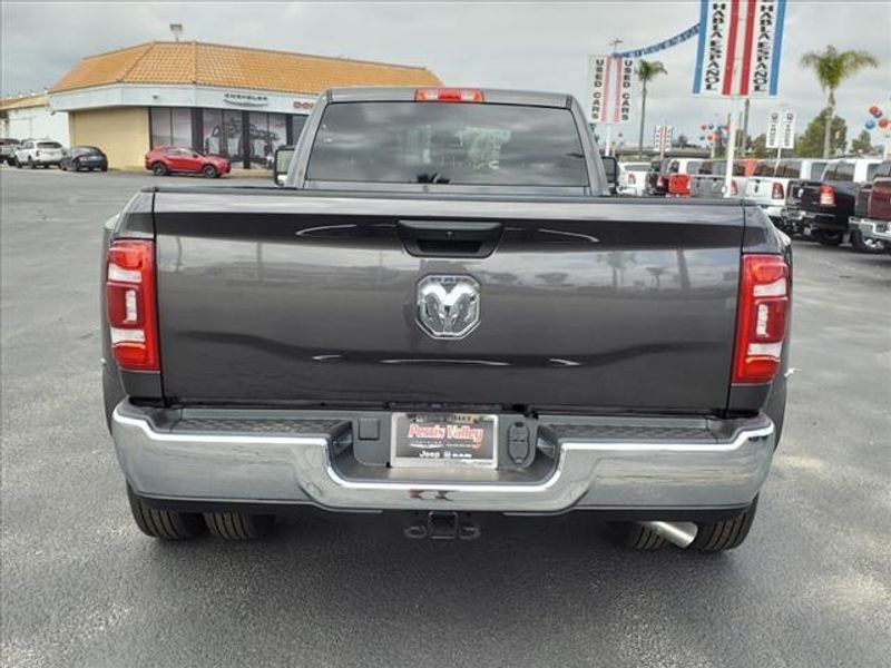 2024 RAM 3500 Tradesman in a Granite Crystal Metallic Clear Coat exterior color and -X8interior. Perris Valley Auto Center 951-657-6100 perrisvalleyautocenter.com 