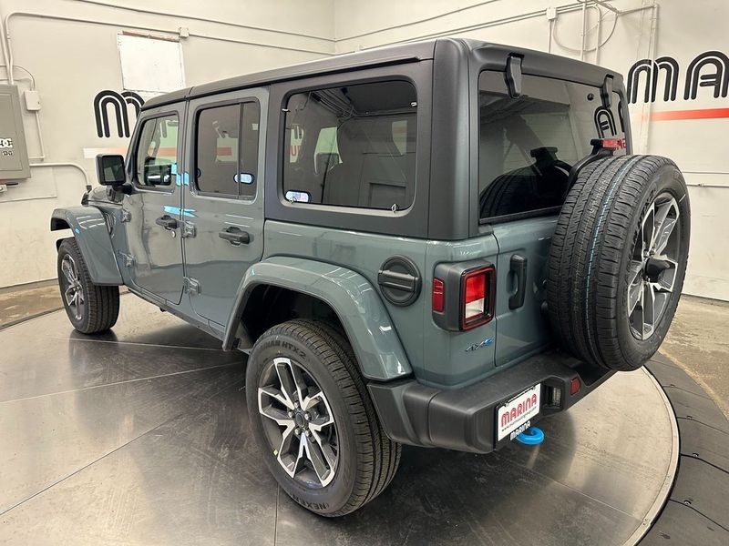 2024 Jeep Wrangler 4-door Sport S 4xe in a Anvil Clear Coat exterior color and Blackinterior. Marina Auto Group (855) 564-8688 marinaautogroup.com 