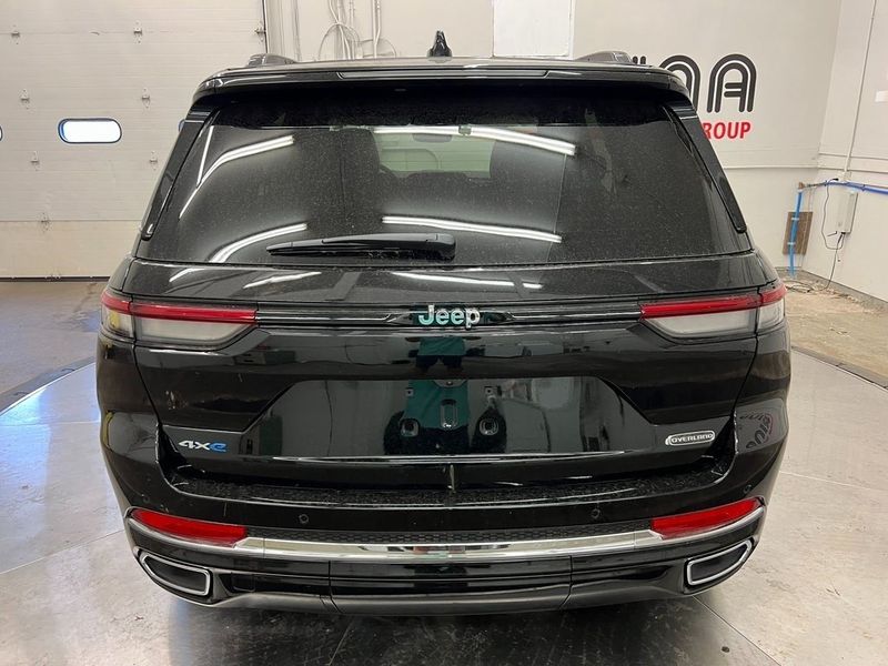 2023 Jeep Grand Cherokee Overland 4xe in a Diamond Black Crystal Pearl Coat exterior color and Global Blackinterior. Marina Auto Group (855) 564-8688 marinaautogroup.com 