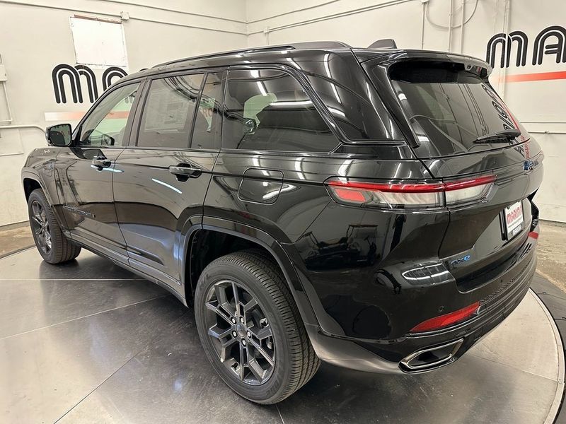 2024 Jeep Grand Cherokee Anniversary Edition 4xe in a Diamond Black Crystal Pearl Coat exterior color and Global Blackinterior. Marina Auto Group (855) 564-8688 marinaautogroup.com 