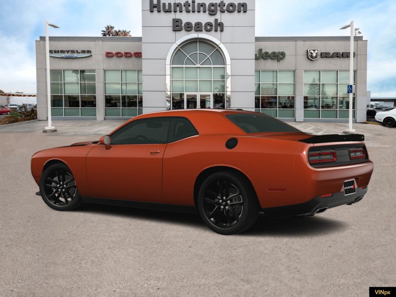 2023 Dodge Challenger GT AWD in a Sinamon Stick exterior color and Blackinterior. BEACH BLVD OF CARS beachblvdofcars.com 