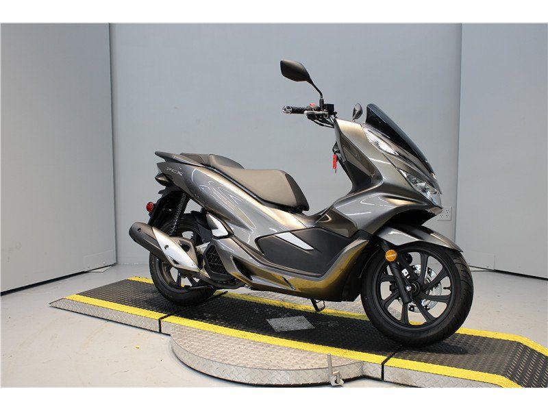 2019 Honda PCX150ABS  in a Gray exterior color. Greater Boston Motorsports 781-583-1799 pixelmotiondemo.com 