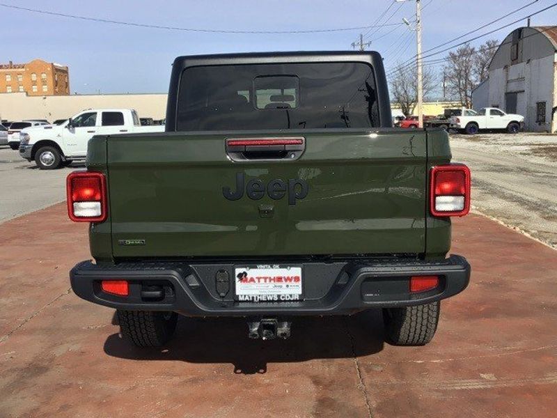2023 Jeep Gladiator Sport S 4x4 in a Sarge Green Clear Coat exterior color and Blackinterior. Matthews Chrysler Dodge Jeep Ram 918-276-8729 cyclespecialties.com 