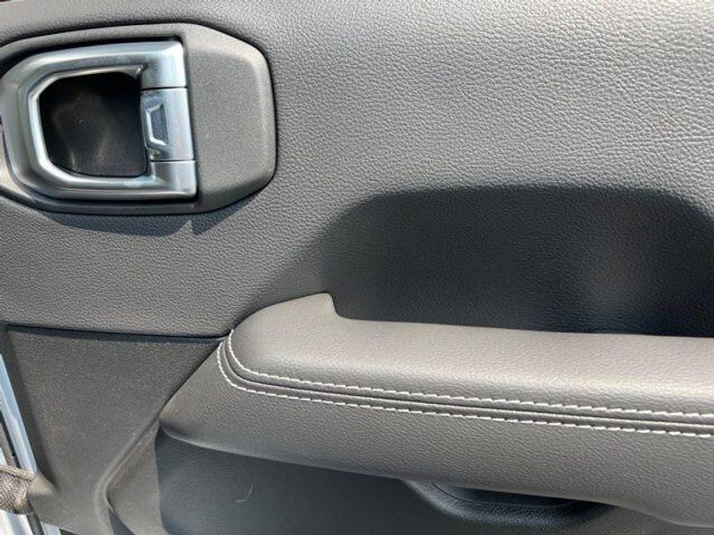 2023 Jeep Wrangler Sahara 4xe in a Silver Zynith Clear Coat exterior color and Blackinterior. Lakeshore CDJR Seaford 302-213-6058 lakeshorecdjr.com 