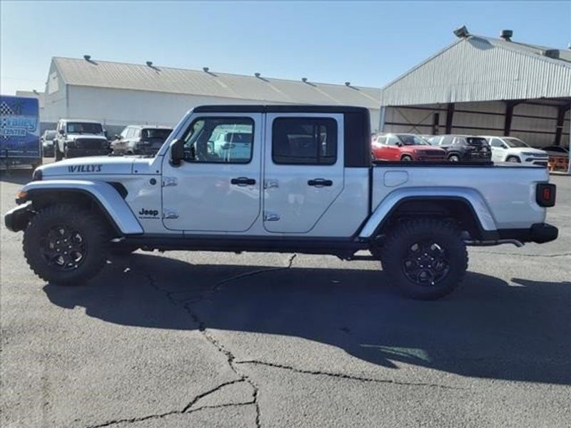 2023 Jeep Gladiator Sport in a Silver Zynith Clear Coat exterior color and Blackinterior. Perris Valley Auto Center 951-657-6100 perrisvalleyautocenter.com 