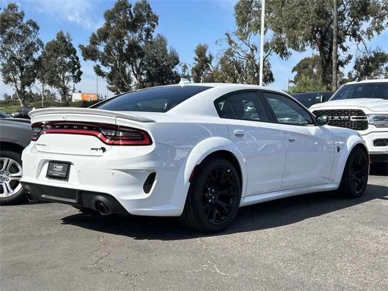 2023 Dodge Charger Srt Hellcat Widebody Jailbreak in a White Knuckle exterior color and Blackinterior. McPeek