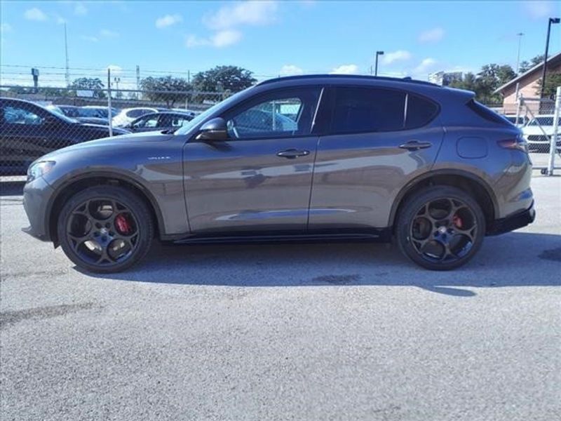 2024 Alfa Romeo Stelvio Veloce in a Vesuvio Gray Metallic exterior color and Blackinterior. Northside Imports Houston 281-475-4549 northsideimportshouston.com 