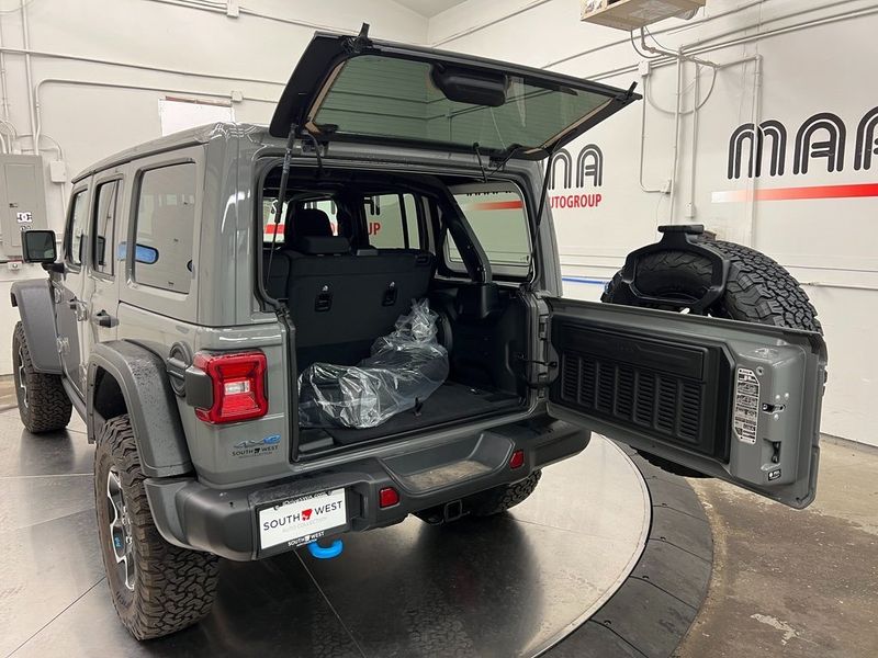 2023 Jeep Wrangler Rubicon 4xe in a Sting-Gray Clear Coat exterior color and Blackinterior. Marina Auto Group (855) 564-8688 marinaautogroup.com 