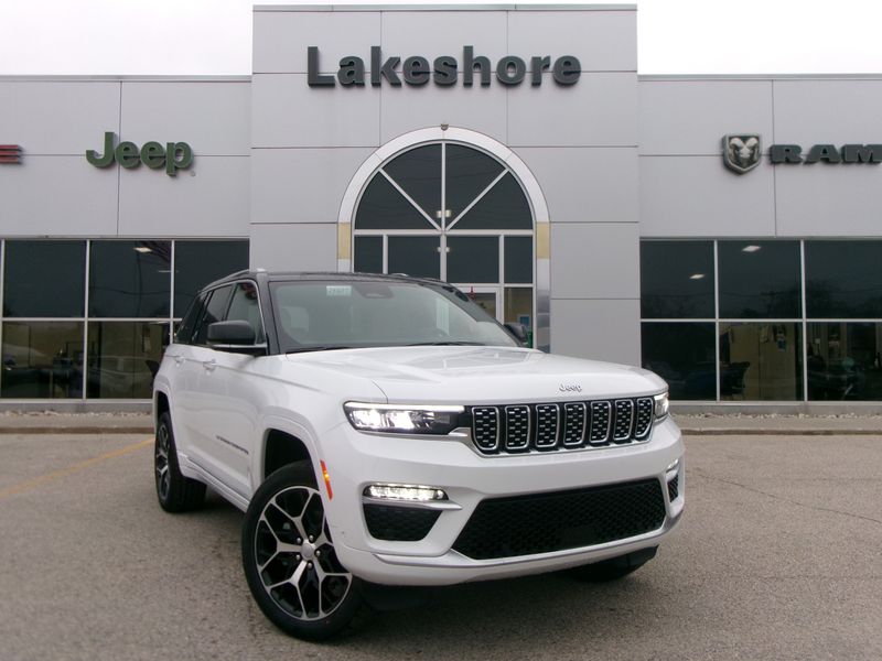 2024 Jeep Grand Cherokee Summit Reserve 4x4 in a Bright White Clear Coat exterior color and Tupelo/Blackinterior. Lakeshore Chrysler Jeep Dodge (231) 500-5209 lakeshorechryslerjeep.com 