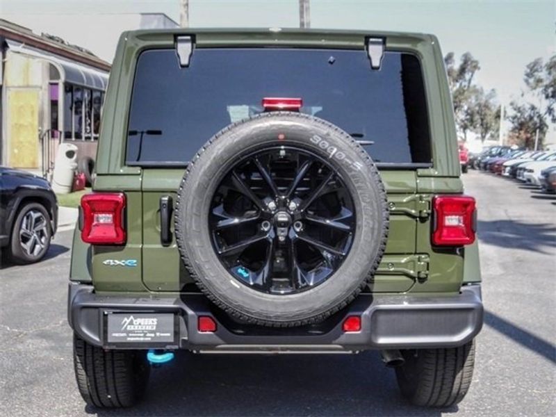 2022 Jeep Wrangler Sahara 4xe in a Sarge Green Clear Coat exterior color and Blackinterior. McPeek