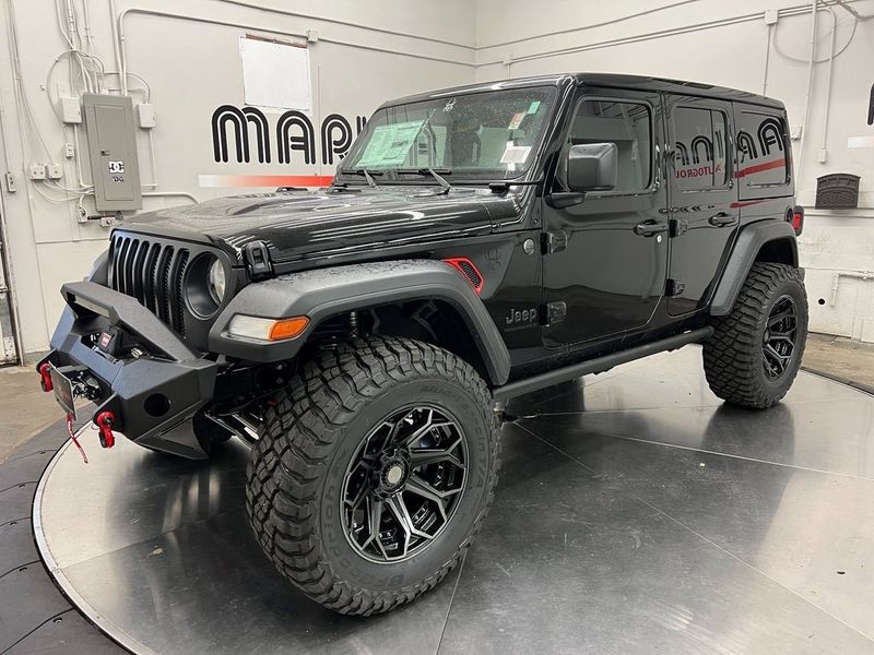 2023 Jeep Wrangler 4-door Sport S 4x4 in a Black Clear Coat exterior color and Blackinterior. Marina Chrysler Dodge Jeep RAM (855) 616-8084 marinadodgeny.com 