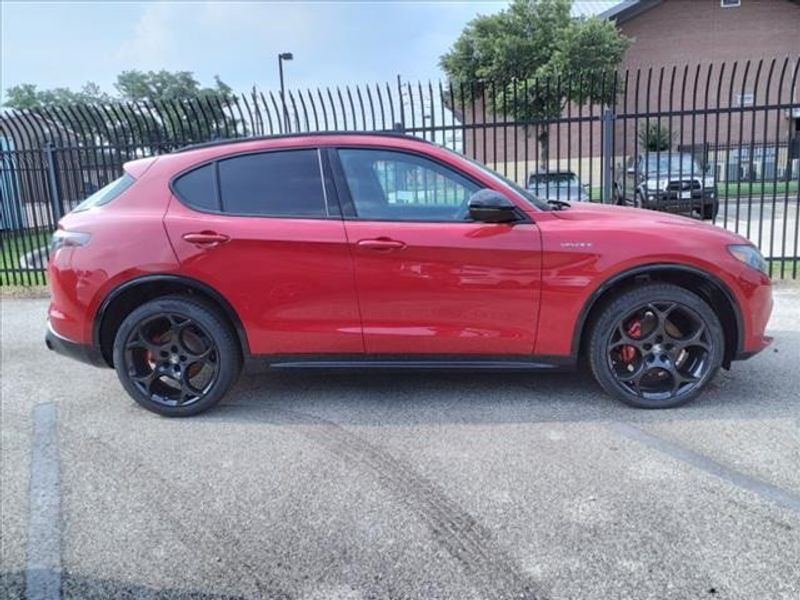 2024 Alfa Romeo Stelvio Veloce in a Alfa Rosso exterior color and Blackinterior. Northside Imports Houston 281-475-4549 northsideimportshouston.com 