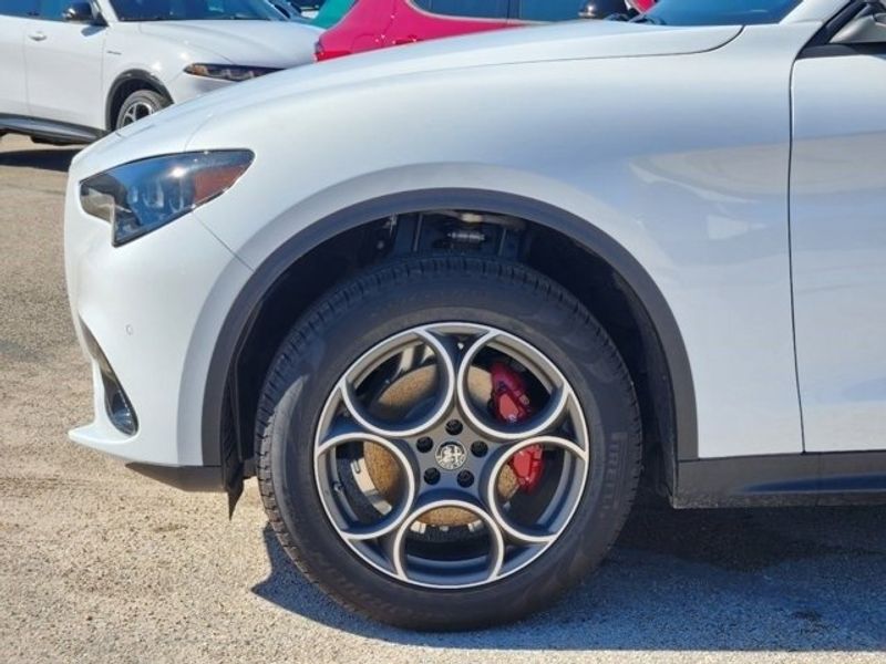 2024 Alfa Romeo Stelvio Sprint in a Alfa White exterior color and Blackinterior. Northside Imports Houston 281-475-4549 northsideimportshouston.com 