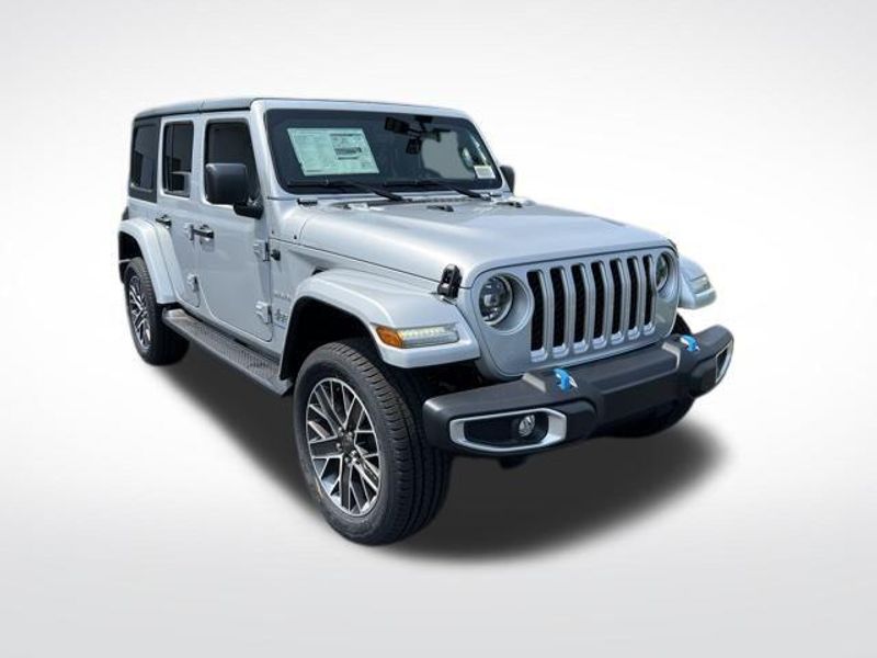 2023 Jeep Wrangler Sahara 4xe in a Silver Zynith Clear Coat exterior color and Blackinterior. Lakeshore CDJR Seaford 302-213-6058 lakeshorecdjr.com 