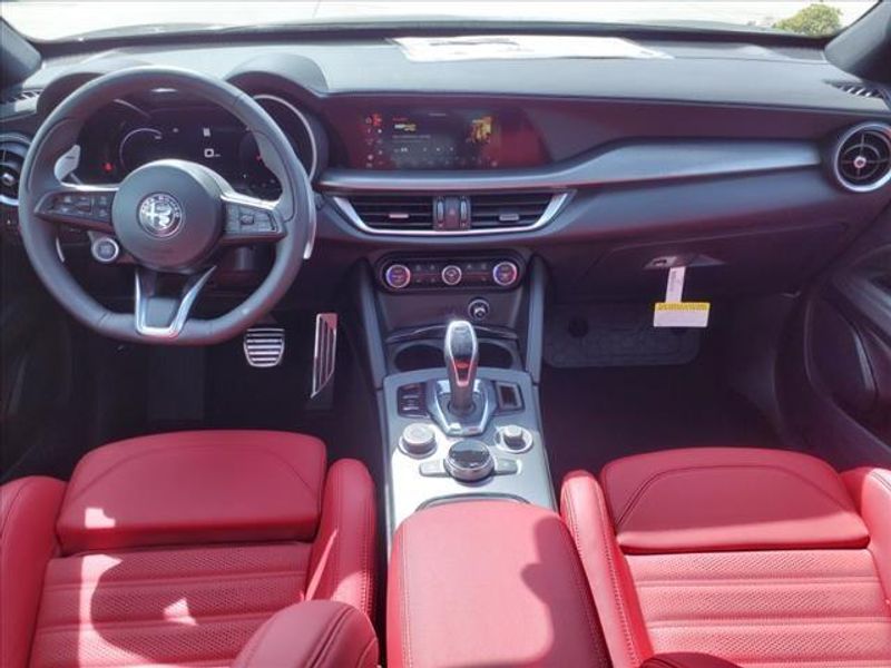 2024 Alfa Romeo Stelvio Veloce in a Vulcano Black Metallic exterior color and Blackinterior. Northside Imports Houston 281-475-4549 northsideimportshouston.com 