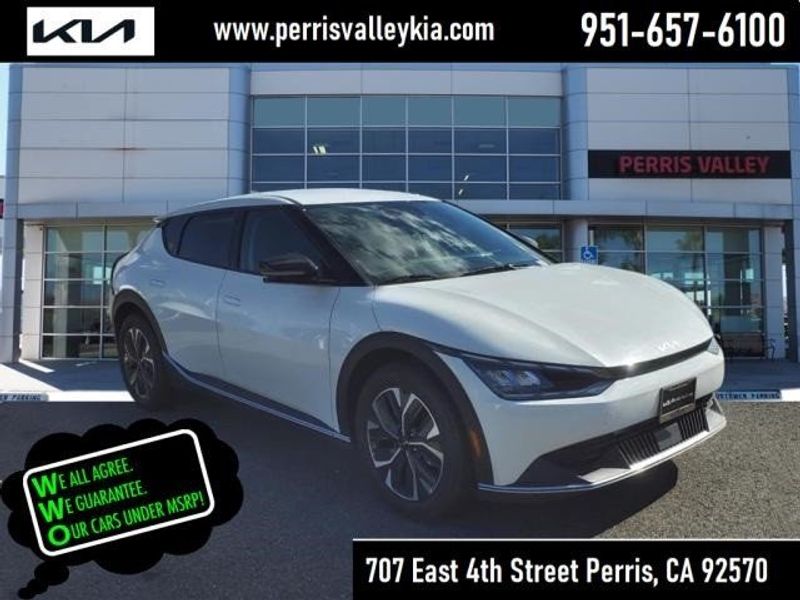 2024 Kia EV6 Light in a Snow White Pearl exterior color and Blackinterior. Perris Valley Auto Center 951-657-6100 perrisvalleyautocenter.com 