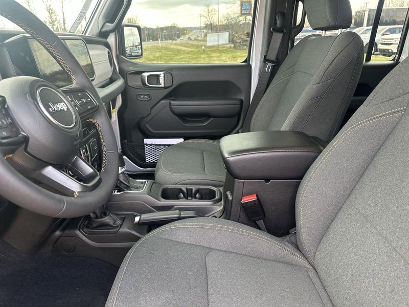 2024 Jeep Wrangler 4-door Sport S in a Silver Zynith Clear Coat exterior color and Blackinterior. Gupton Motors Inc 615-384-2886 guptonmotors.com 