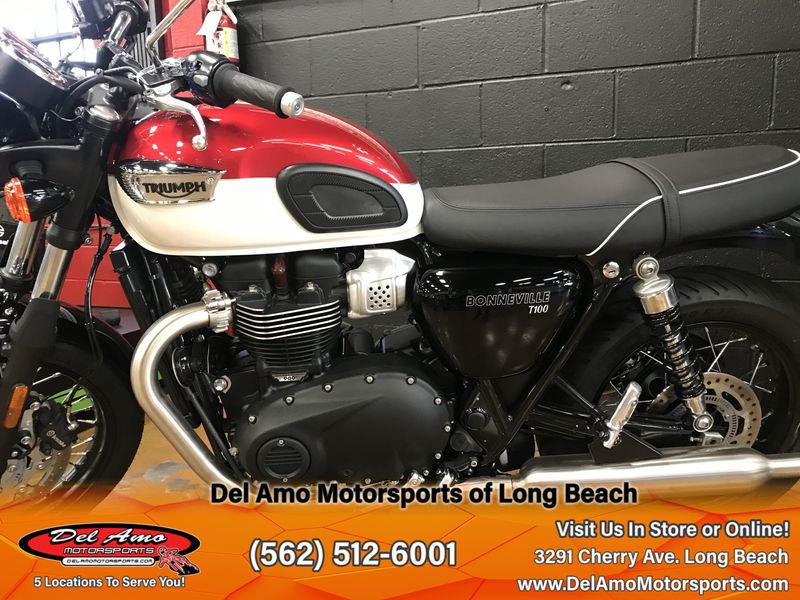 2023 Triumph BONNEVILLE T100  in a CARNIVAL RED/FUSION WHITE exterior color. Del Amo Motorsports of Long Beach (562) 362-3160 delamomotorsports.com 