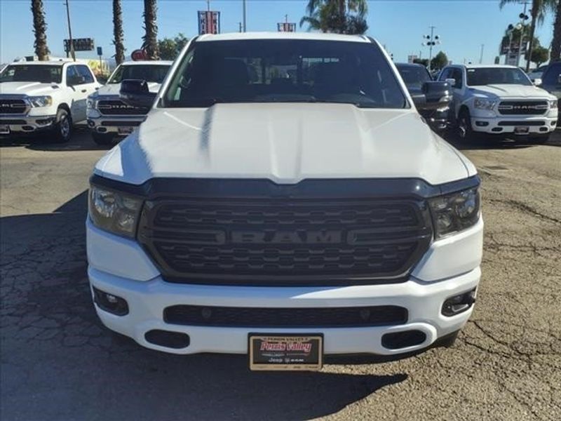 2024 RAM 1500 Big Horn Lone Star in a Bright White Clear Coat exterior color and Blackinterior. Perris Valley Auto Center 951-657-6100 perrisvalleyautocenter.com 