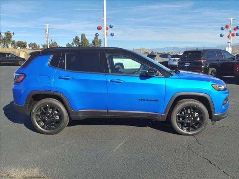2024 Jeep Compass Latitude in a Laser Blue Pearl Coat exterior color and Blackinterior. Perris Valley Auto Center 951-657-6100 perrisvalleyautocenter.com 