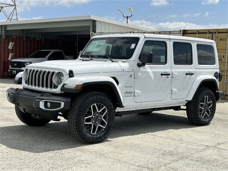 Jeep Wrangler 4xE Sahara in a Bright White Clear Coat exterior color and Blackinterior. McPeek