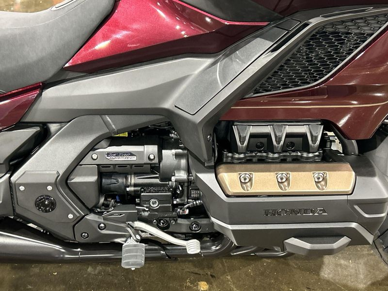 2025 Honda GOLDWING TOUR AIR BAG DCT  in a BORDEAUX RED METALLIC exterior color. Del Amo Motorsports of Redondo Beach (424) 390-7811 delamomotorsports.com 