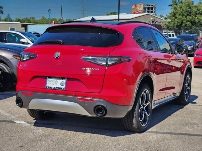 2024 Alfa Romeo Stelvio Ti in a Alfa Rosso exterior color and Blackinterior. Northside Imports Houston 281-475-4549 northsideimportshouston.com 