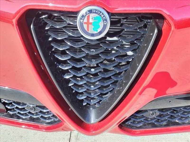 2024 Alfa Romeo Stelvio Sprint in a Alfa Rosso exterior color and Blackinterior. Northside Imports Houston 281-475-4549 northsideimportshouston.com 