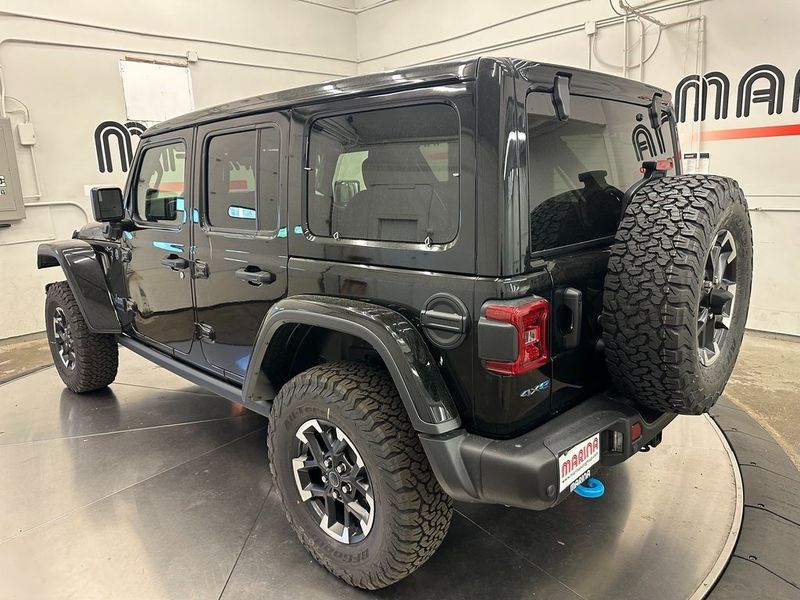 2024 Jeep Wrangler 4-door Rubicon X 4xe in a Black Clear Coat exterior color and Blackinterior. Marina Chrysler Dodge Jeep RAM (855) 616-8084 marinadodgeny.com 