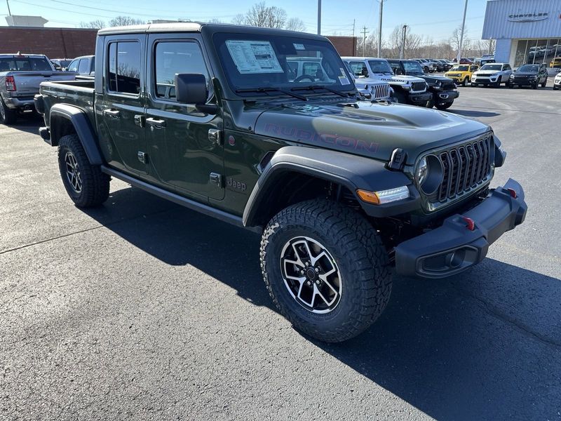 2024 Jeep Gladiator Rubicon 4x4 in a Sarge Green Clear Coat exterior color. Gupton Motors Inc 615-384-2886 guptonmotors.com 