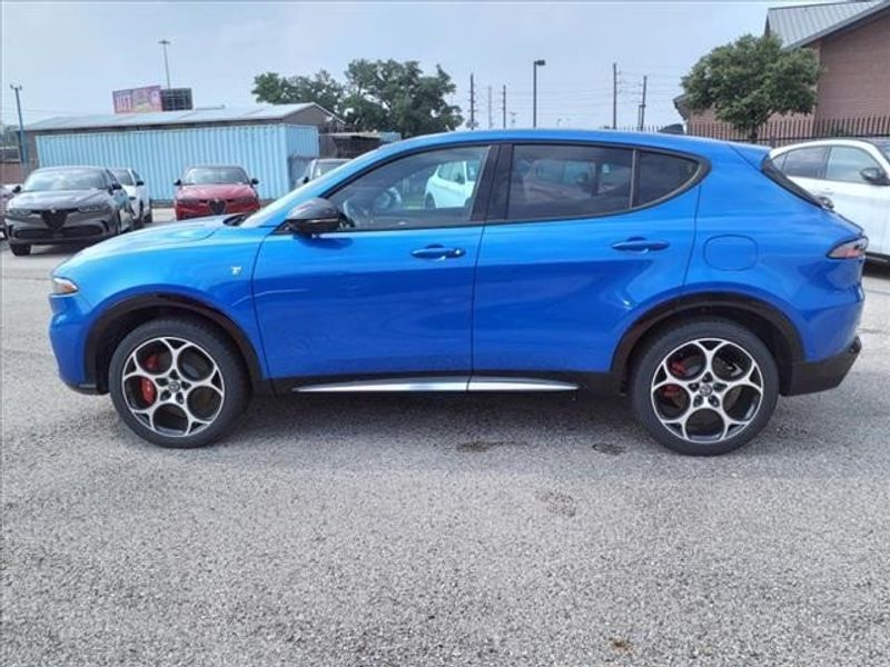 2024 Alfa Romeo Tonale Ti in a Misano Blue Metallic exterior color and Tan/Blackinterior. Northside Imports Houston 281-475-4549 northsideimportshouston.com 