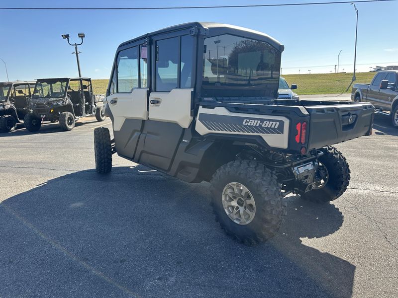 2025 CAN-AM DEFENDER MAX LIMITED CAB HD10 DESERT TAN AND STEALTH BLACK in a DESERT TAN AND STEALTH BLACK exterior color. Family PowerSports (877) 886-1997 familypowersports.com 