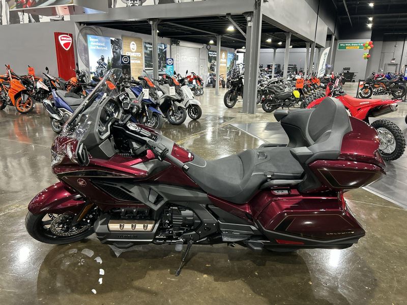 2025 Honda GOLDWING TOUR AIR BAG DCT  in a BORDEAUX RED METALLIC exterior color. Del Amo Motorsports of Redondo Beach (424) 390-7811 delamomotorsports.com 