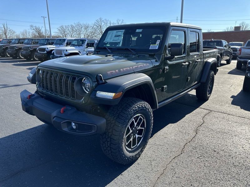 2024 Jeep Gladiator Rubicon 4x4 in a Sarge Green Clear Coat exterior color. Gupton Motors Inc 615-384-2886 guptonmotors.com 