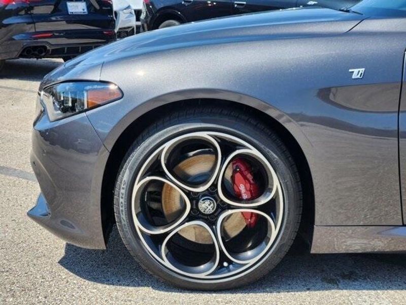 2024 Alfa Romeo Giulia Ti in a Vesuvio Gray Metallic exterior color and Blackinterior. Northside Imports Houston 281-475-4549 northsideimportshouston.com 