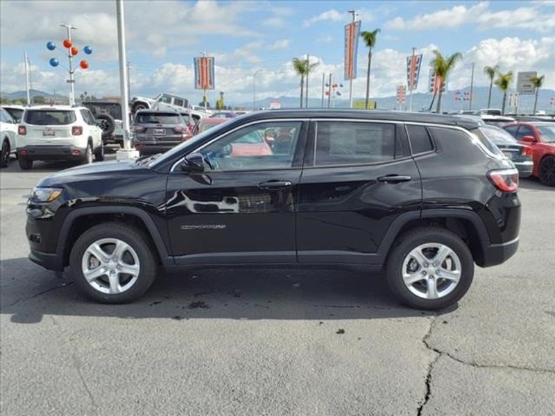 2024 Jeep Compass Sport in a Diamond Black Crystal Pearl Coat exterior color and Blackinterior. Perris Valley Auto Center 951-657-6100 perrisvalleyautocenter.com 