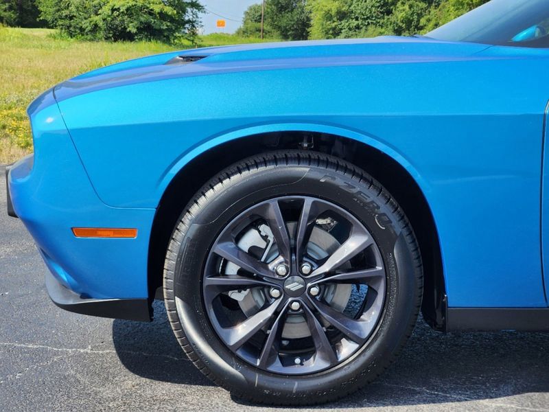 2023 Dodge Challenger SXT Awd in a B5 Blue exterior color and Blackinterior. Elder Chrysler Dodge Jeep Ram 9032920419 elderchryslerdodgejeep.com 