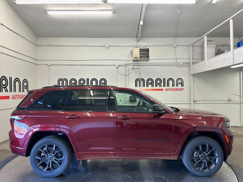 2024 Jeep Grand Cherokee Anniversary Edition 4xe in a Velvet Red Pearl Coat exterior color and Global Blackinterior. Marina Auto Group (855) 564-8688 marinaautogroup.com 