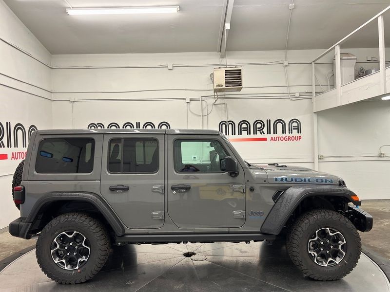 2023 Jeep Wrangler Rubicon 4xe in a Sting-Gray Clear Coat exterior color and Blackinterior. Marina Auto Group (855) 564-8688 marinaautogroup.com 