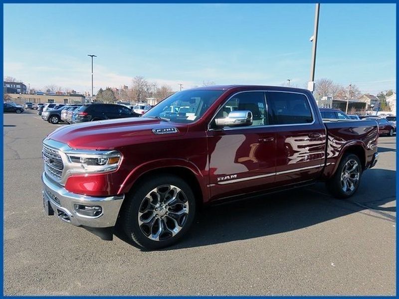 2024 RAM 1500 Limited in a Delmonico Red Pearl Coat exterior color and Blackinterior. Papas Jeep Ram In New Britain, CT 860-356-0523 papasjeepram.com 