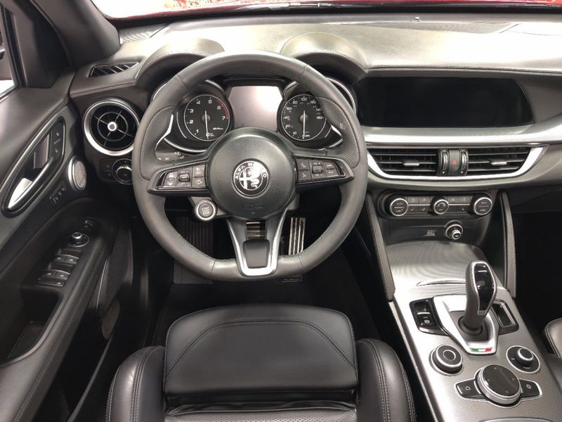 2023 Alfa Romeo Stelvio Veloce Q4 AWD w/Prem & Activ Pkg in a Rosso Etna exterior color and Black Heated Sport Leatherinterior. Schmelz Countryside Alfa Romeo (651) 867-3222 schmelzalfaromeo.com 