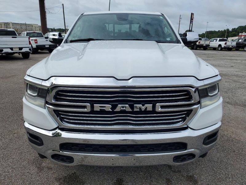 2020 RAM 1500 Laramie in a Bright White Clear Coat exterior color and Blackinterior. Johnson Dodge 601-693-6343 pixelmotiondemo.com 
