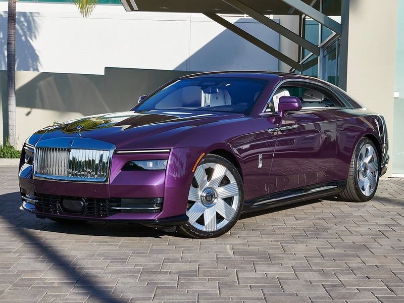 2024 Rolls-Royce Spectre  in a Twilight Purple exterior color and Arctic Whiteinterior. SHELLY AUTOMOTIVE shellyautomotive.com 