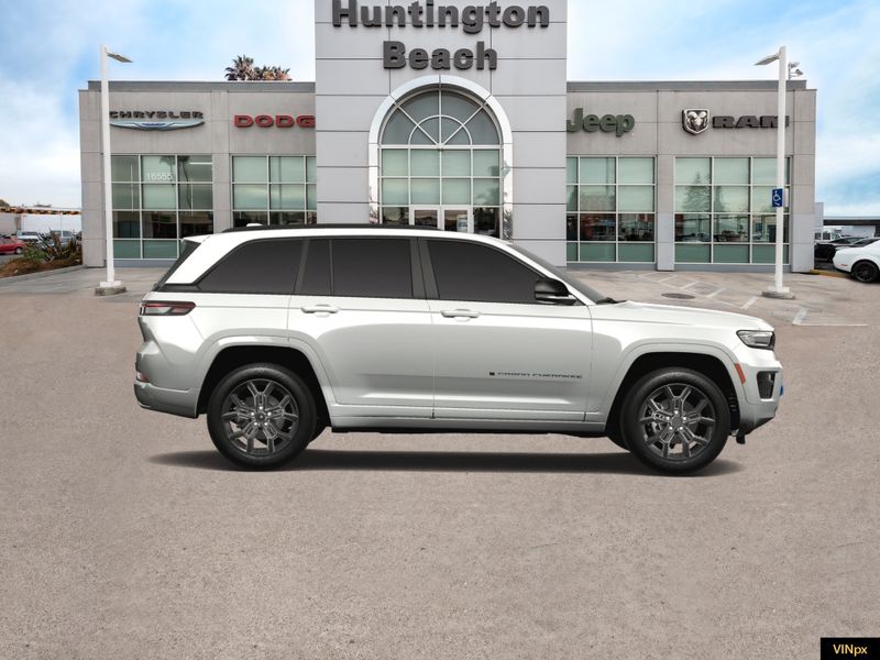 2023 Jeep Grand Cherokee 4xe Base 30th Anniversary 4x4 in a Bright White exterior color and Global Blackinterior. BEACH BLVD OF CARS beachblvdofcars.com 