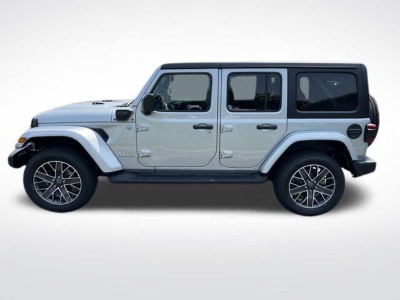 2023 Jeep Wrangler Sahara 4xe in a Silver Zynith Clear Coat exterior color and Blackinterior. Lakeshore CDJR Seaford 302-213-6058 lakeshorecdjr.com 