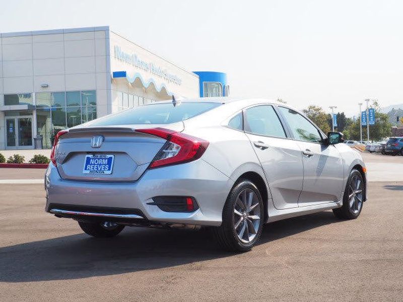 2020 Honda Civic Sedan EX in a Lunar Silver Metallic exterior color and Blackinterior. BEACH BLVD OF CARS beachblvdofcars.com 